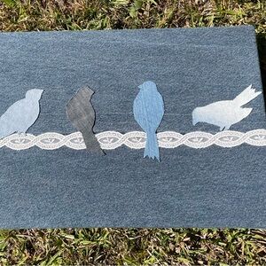Denim wall hanging. Birds on lace. Made w recycled denim lace. 13 3/4” x 19 3/4”